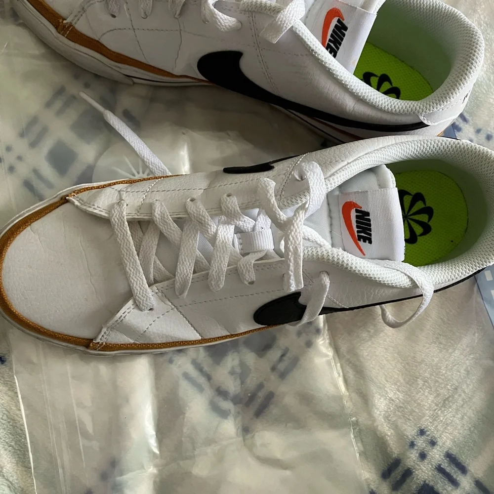 Nike women’s Legacy White Leather Sneakers with Black Swoosh and Tan Accent - Picture 2 of 5